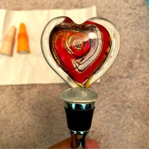 A Lot Of 3 wine bottle stoppers. 2 rabbit brands, 1 with glass heart shaped top